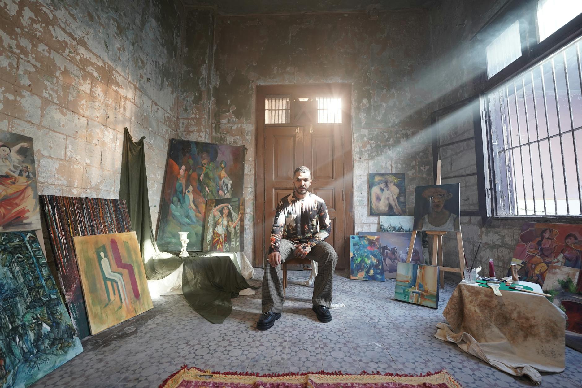 painter sitting in a workshop